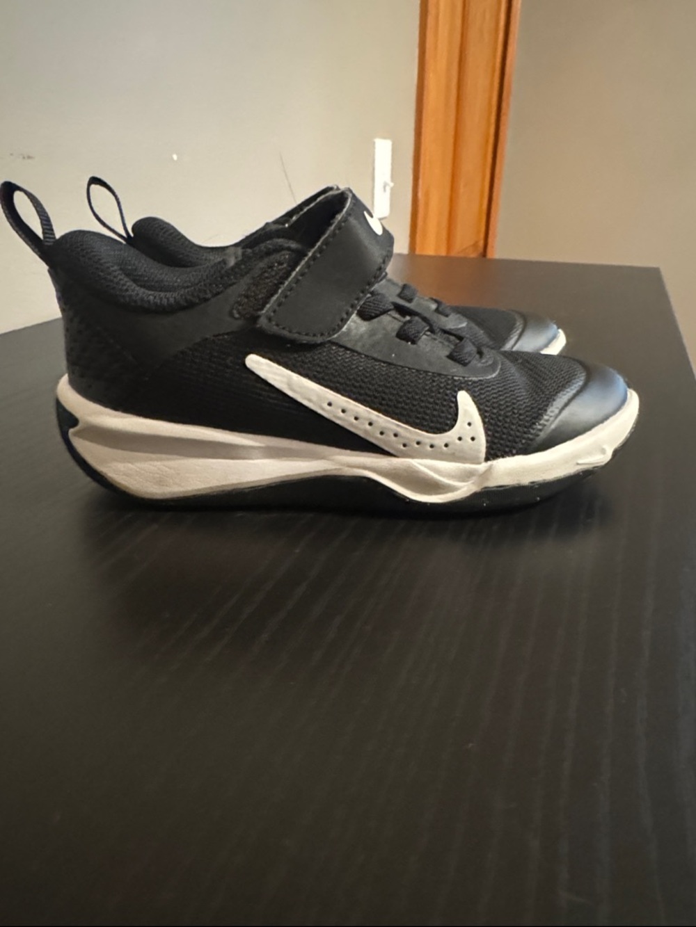 Nike Kids Black Sneakers with White Swoosh